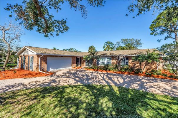 Attached, Backyard, Exterior, Facade, Brick Facade, Ranch