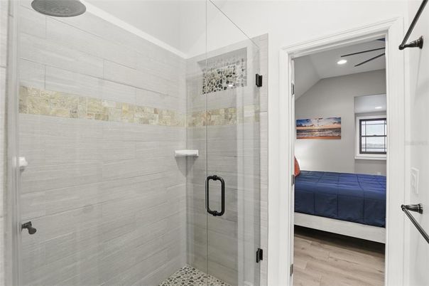 Bathroom, Bedroom, Glass Shower, Interior, Recessed Lighting, Wood Texture Flooring