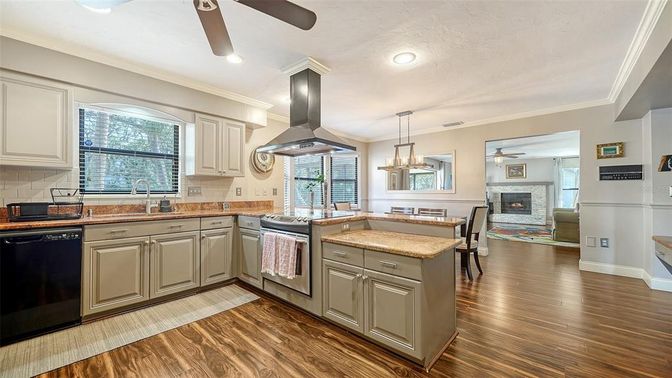 Dining room, Fireplace, Interior, Kitchen, Pendant Lights, Recessed Lighting, Wood Texture Flooring