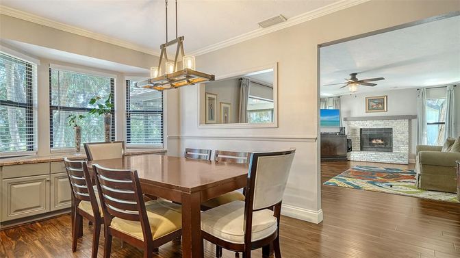 Dining room, Fireplace, Interior, Living room, Pendant Lights, Wood Texture Flooring