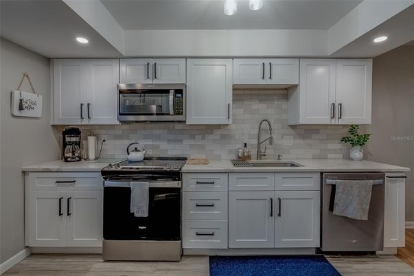 Interior, Kitchen, Recessed Lighting, Stainless Steel Appliances, Wood Texture Flooring