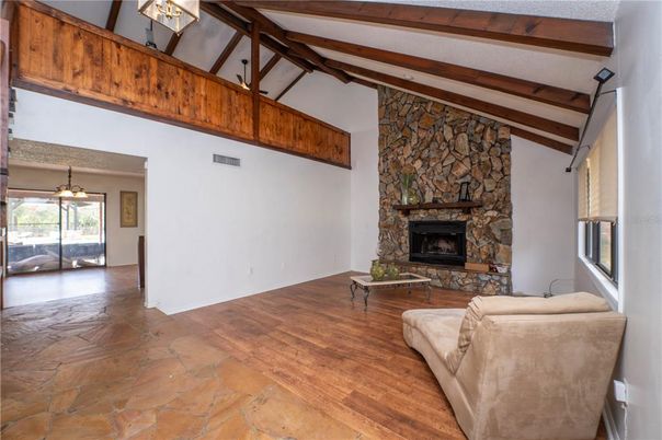 Fireplace, Interior, Living room, Stone Walls, Wooden Beams, Wood Texture Flooring