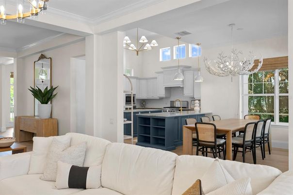 Chandelier, Dining room, Interior, Kitchen, Living room, Pendant Lights, Stainless Steel Appliances, Wood Texture Flooring