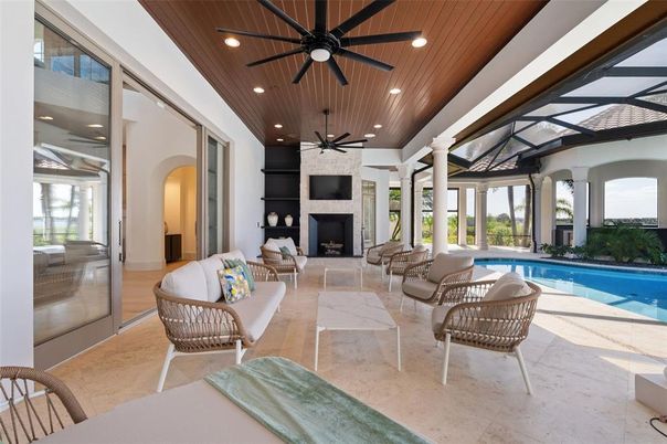 Fireplace, Glass Ceilings, Interior, Living room, Pool, Recessed Lighting, Sun Room, Wooden Ceilings