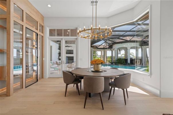 Chandelier, Dining room, Glass Ceilings, Interior, Pendant Lights, Recessed Lighting, Wood Texture Flooring