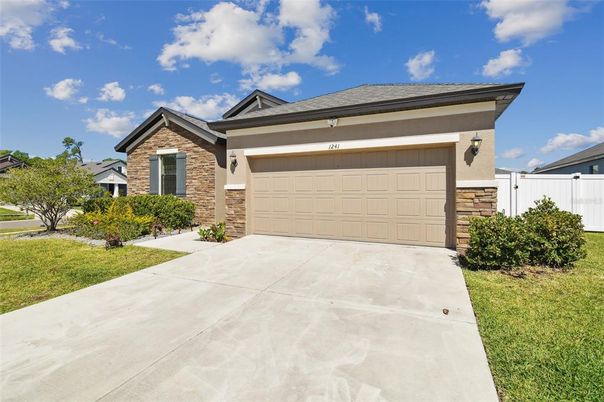 Attached, Exterior, Facade, Brick Facade, Modern