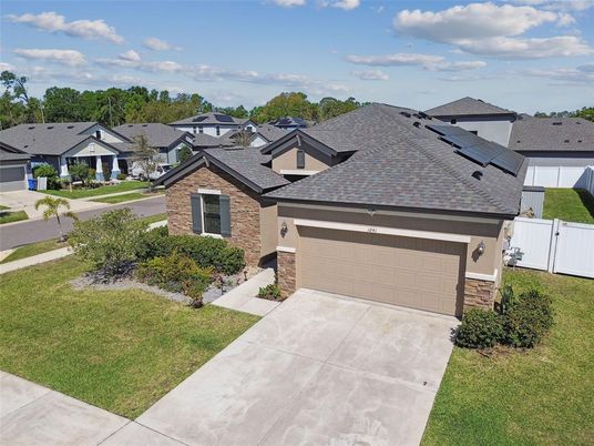 Attached, Exterior, Facade, Solar Panels, Brick Traditional