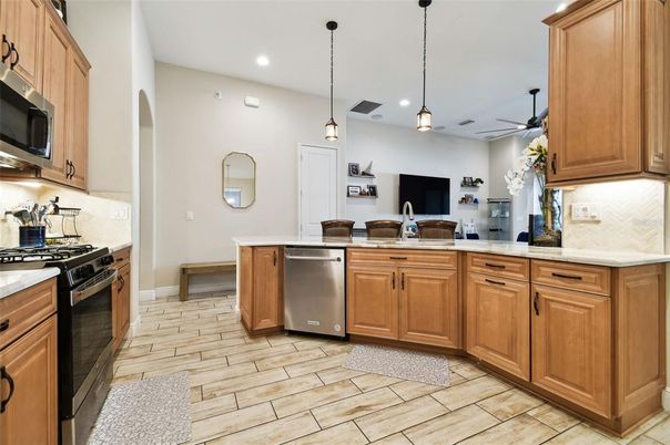 Interior, Kitchen, Pendant Lights, Recessed Lighting, Stainless Steel Appliances, Wood Texture Flooring
