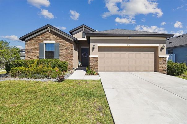 Attached, Exterior, Facade, Brick Facade, American Craftsman