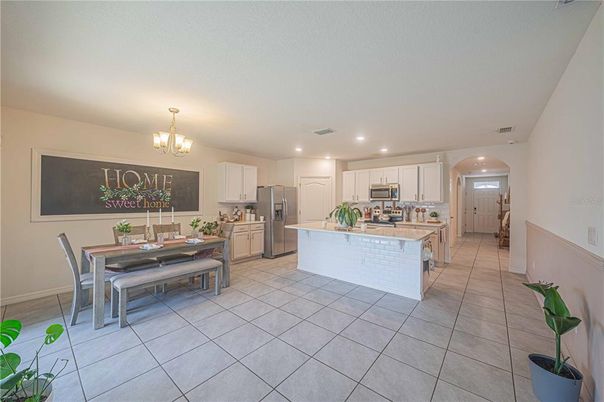 Chandelier, Dining room, Interior, Kitchen, Recessed Lighting, Stainless Steel Appliances