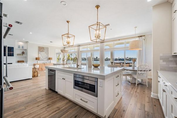 Dining room, Interior, Kitchen, Living room, Pendant Lights, Recessed Lighting, Stainless Steel Appliances, Wood Texture Flooring