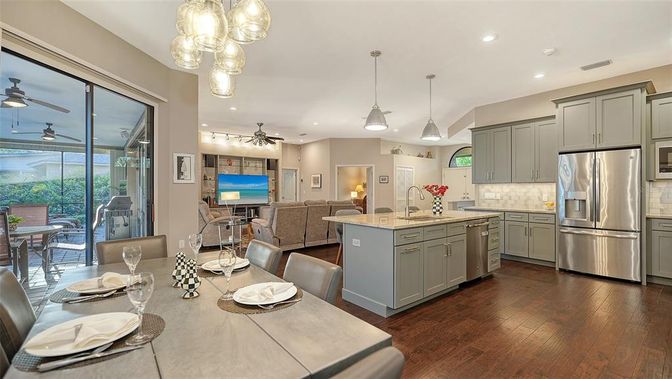 Dining room, Interior, Kitchen, Living room, Pendant Lights, Recessed Lighting, Stainless Steel Appliances, Wood Texture Flooring