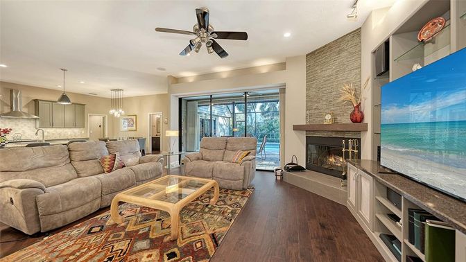 Fireplace, Interior, Kitchen, Living room, Pendant Lights, Recessed Lighting, Stone Walls, Wood Texture Flooring