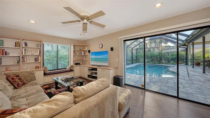 Interior, Living room, Pool, Recessed Lighting, Sun Room, Wood Texture Flooring