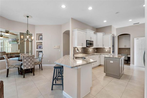 Chandelier, Dining room, Interior, Kitchen, Pendant Lights, Recessed Lighting, Stainless Steel Appliances