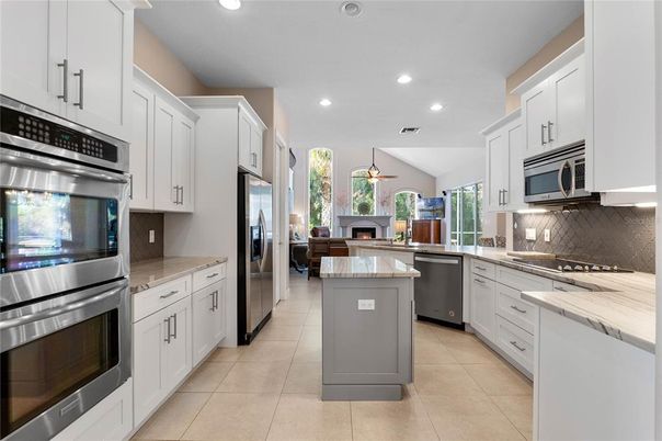 Fireplace, Interior, Kitchen, Recessed Lighting, Stainless Steel Appliances