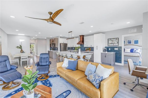 Dining room, Interior, Kitchen, Living room, Recessed Lighting, Stainless Steel Appliances, Wood Texture Flooring