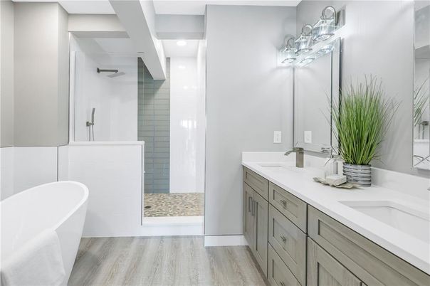 Bathroom, Dual Sink Vanities, Free Standing Baths, Interior, Recessed Lighting, Wood Texture Flooring