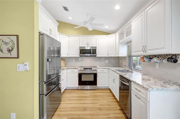 Interior, Kitchen, Recessed Lighting, Stainless Steel Appliances, Wood Texture Flooring
