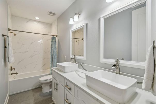 Bathroom, Dual Sink Vanities, Interior, Marble Walls, Recessed Lighting