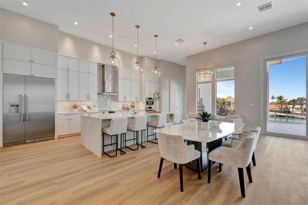 Dining room, Interior, Kitchen, Pendant Lights, Recessed Lighting, Stainless Steel Appliances, Wood Texture Flooring