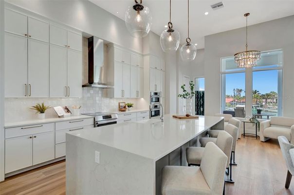 Chandelier, Interior, Kitchen, Pendant Lights, Recessed Lighting, Stainless Steel Appliances, Wood Texture Flooring