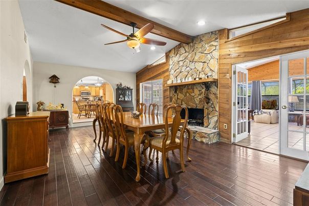 Dining room, Fireplace, Interior, Recessed Lighting, Stone Walls, Wooden Beams, Wood Texture Flooring, Wooden Walls