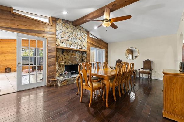 Dining room, Fireplace, Interior, Recessed Lighting, Stone Walls, Wooden Beams, Wood Texture Flooring, Wooden Walls