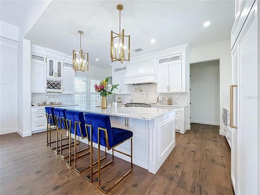 Interior, Kitchen, Marble Walls, Pendant Lights, Recessed Lighting, Wood Texture Flooring