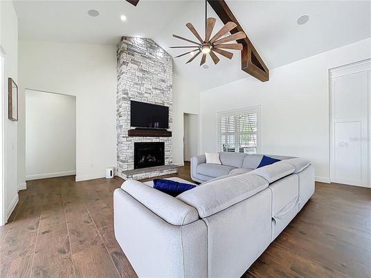 Fireplace, Interior, Living room, Recessed Lighting, Stone Walls, Wooden Beams, Wood Texture Flooring