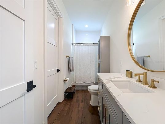 Bathroom, Dual Sink Vanities, Interior, Recessed Lighting, Wood Texture Flooring