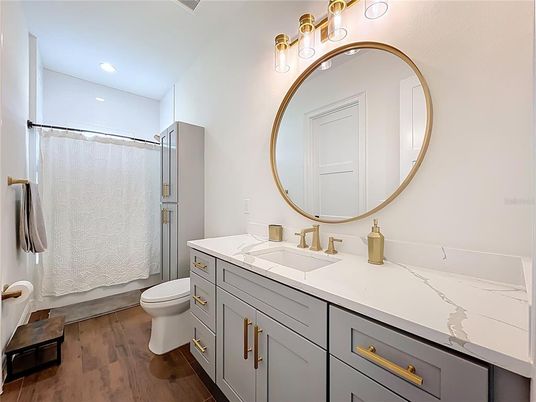 Bathroom, Dual Sink Vanities, Interior, Recessed Lighting, Wood Texture Flooring