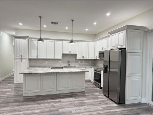 Interior, Kitchen, Pendant Lights, Recessed Lighting, Stainless Steel Appliances, Wood Texture Flooring