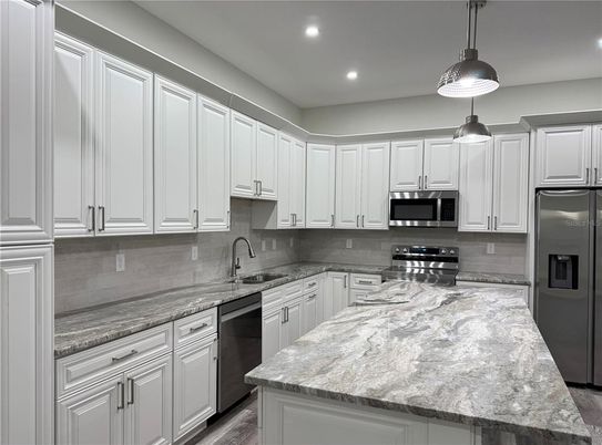 Interior, Kitchen, Pendant Lights, Recessed Lighting, Stainless Steel Appliances, Wood Texture Flooring