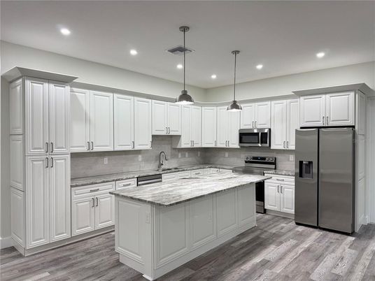 Interior, Kitchen, Pendant Lights, Recessed Lighting, Stainless Steel Appliances, Wood Texture Flooring
