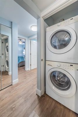 Bedroom, Interior, Utility Closets, Washer, Wood Texture Flooring