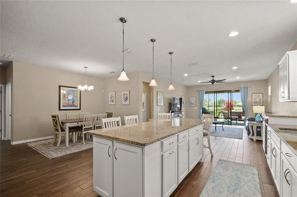 Chandelier, Dining room, Interior, Kitchen, Living room, Pendant Lights, Recessed Lighting, Wood Texture Flooring