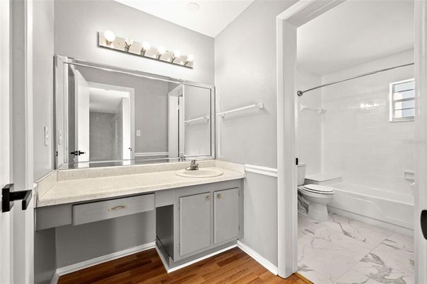 Bathroom, Dual Sink Vanities, Interior, Marble, Wood Texture Flooring