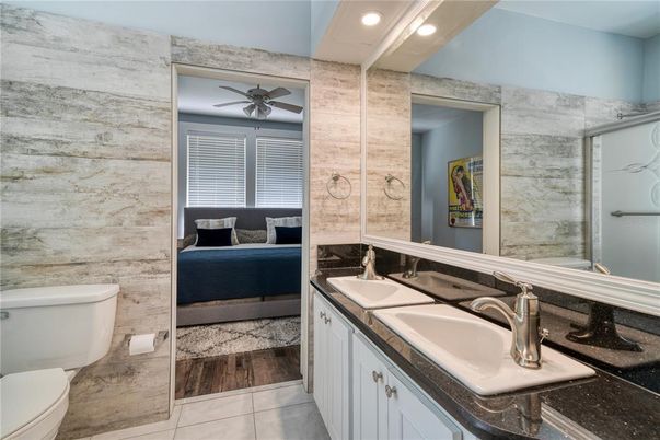 Bathroom, Bedroom, Dual Sink Vanities, Interior, Recessed Lighting, Wood Texture Flooring