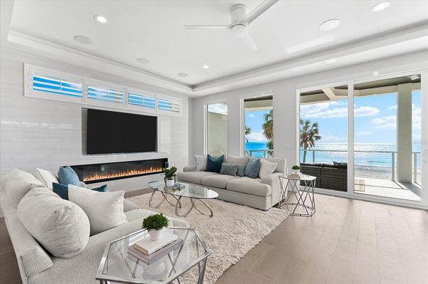 Fireplace, Interior, Living room, Recessed Lighting, Water, Wood Texture Flooring
