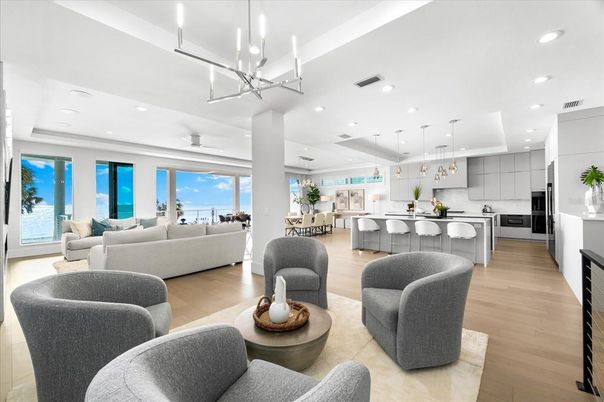 Dining room, Interior, Kitchen, Living room, Pendant Lights, Recessed Lighting, Stainless Steel Appliances, Water, Wood Texture Flooring