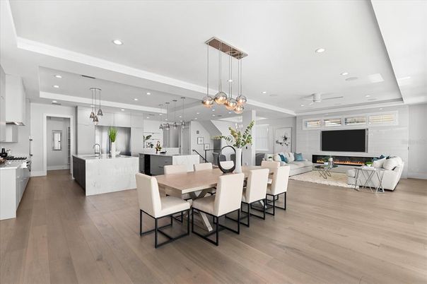 Dining room, Interior, Kitchen, Living room, Pendant Lights, Recessed Lighting, Stainless Steel Appliances, Wood Texture Flooring
