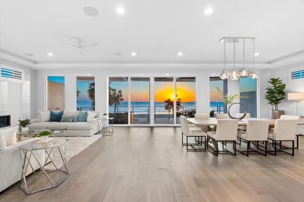 Dining room, Fireplace, Interior, Living room, Pendant Lights, Recessed Lighting, Water, Wood Texture Flooring