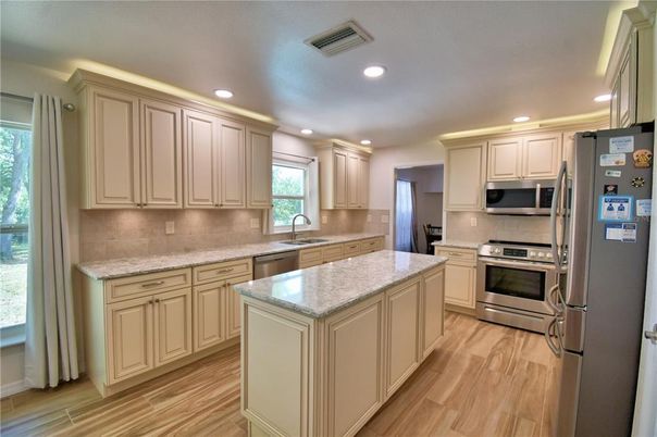 Interior, Kitchen, Recessed Lighting, Stainless Steel Appliances, Wood Texture Flooring