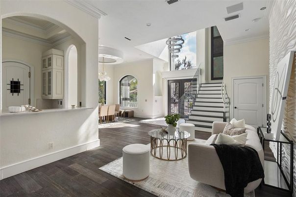 Chandelier, Dining room, Fireplace, Interior, Living room, Recessed Lighting, Wood Texture Flooring