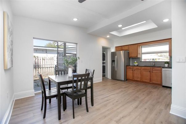 Dining room, Interior, Kitchen, Recessed Lighting, Stainless Steel Appliances, Wood Texture Flooring