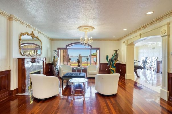 Chandelier, Fireplace, Interior, Living room, Recessed Lighting, Wood Texture Flooring