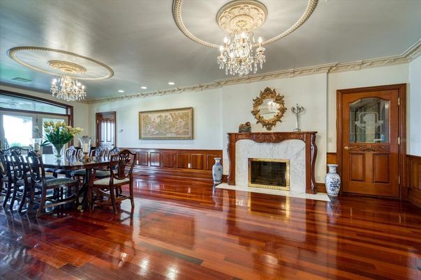 Chandelier, Dining room, Fireplace, Interior, Recessed Lighting, Wood Texture Flooring