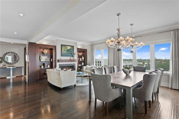Chandelier, Dining room, Fireplace, Interior, Living room, Recessed Lighting, Wood Texture Flooring