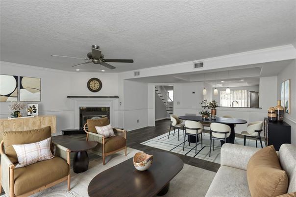 Dining room, Fireplace, Interior, Living room, Pendant Lights, Recessed Lighting, Wood Texture Flooring
